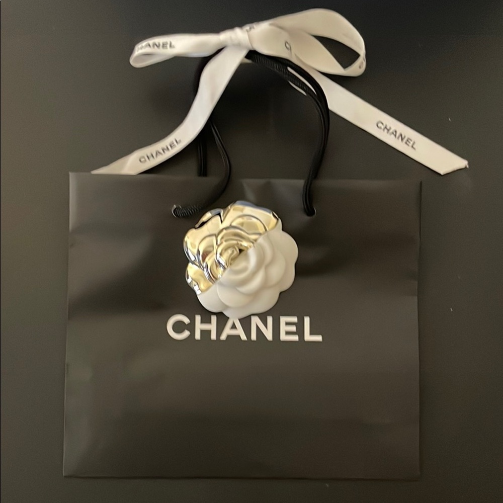 CHANEL shopping Black Bag with White Ribbon and Flower Accent